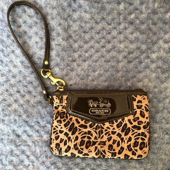 Coach Handbags - Coach wristlet leo print.